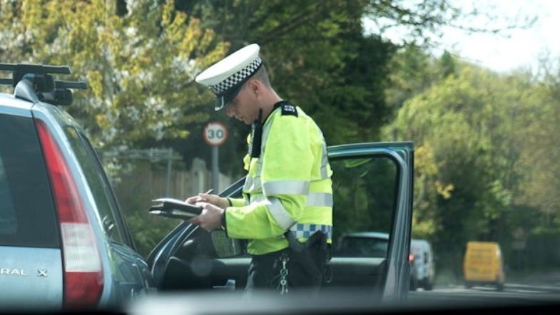 Police stopping driver
